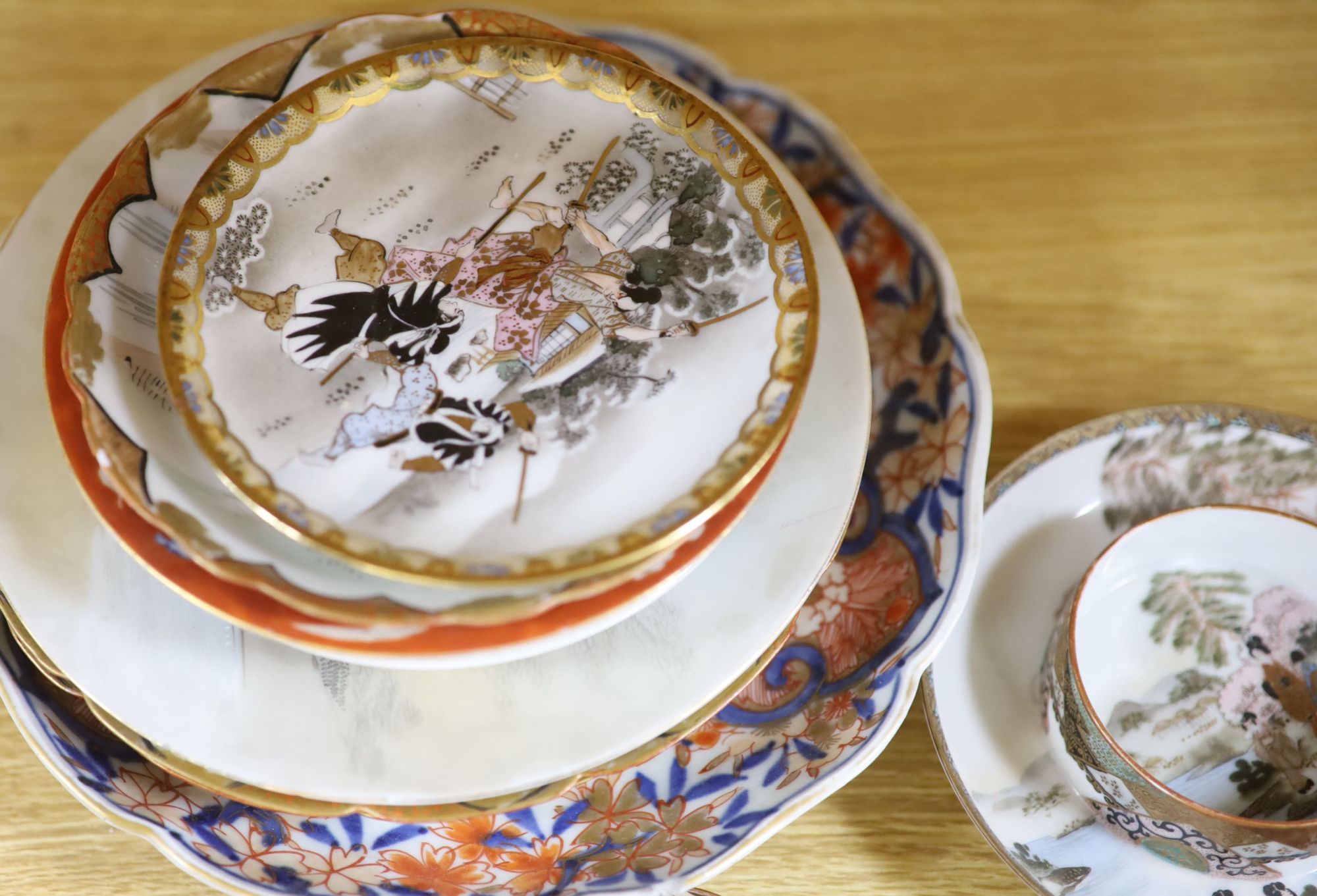 A group of Japanese ceramic teawares and plates, Meiji